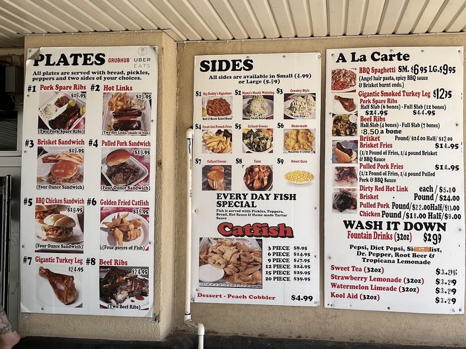 Barbecue dishes arranged for pickup or dine-in.