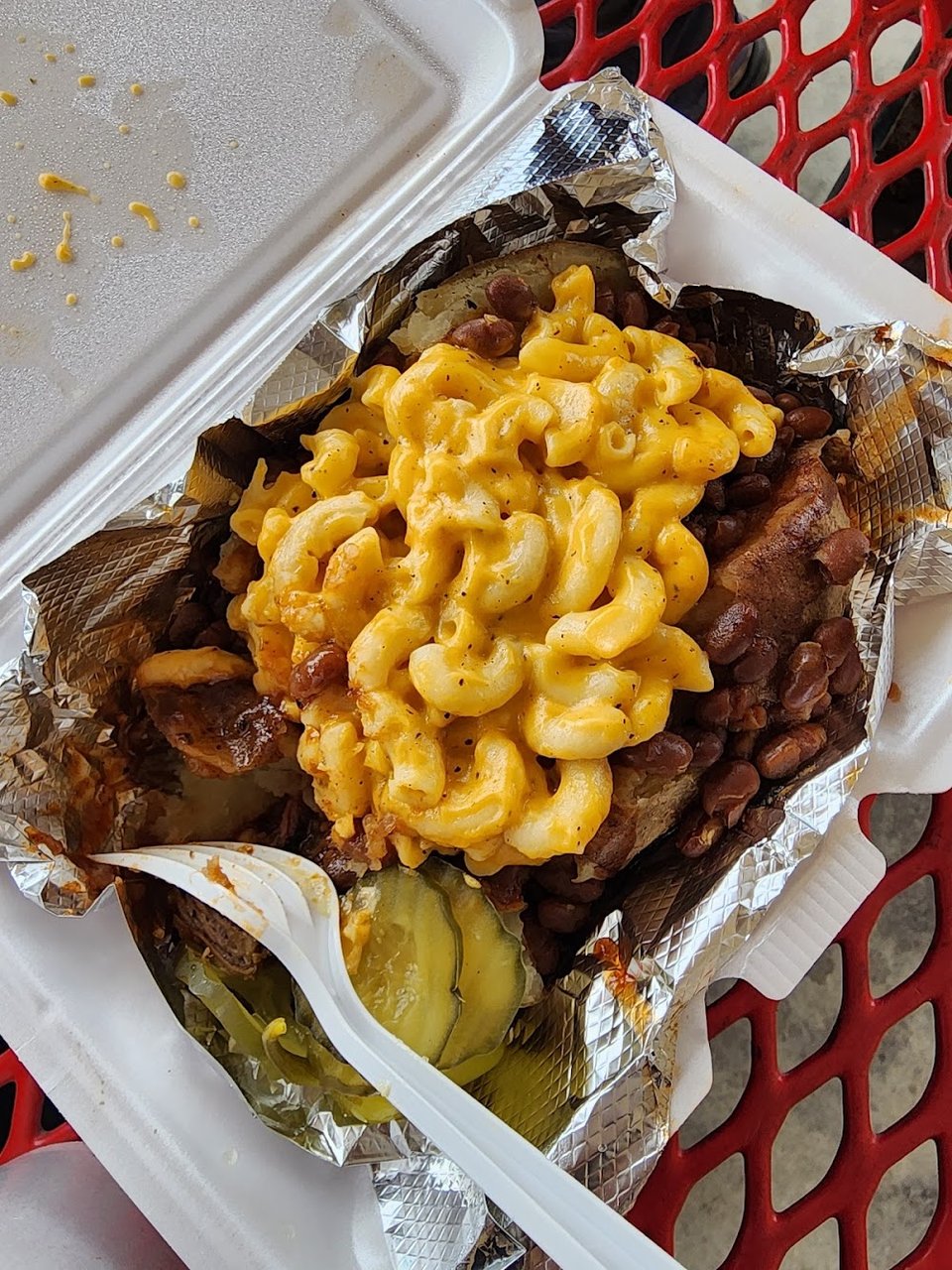 Takeout menu with ribs, sandwiches, and sides.